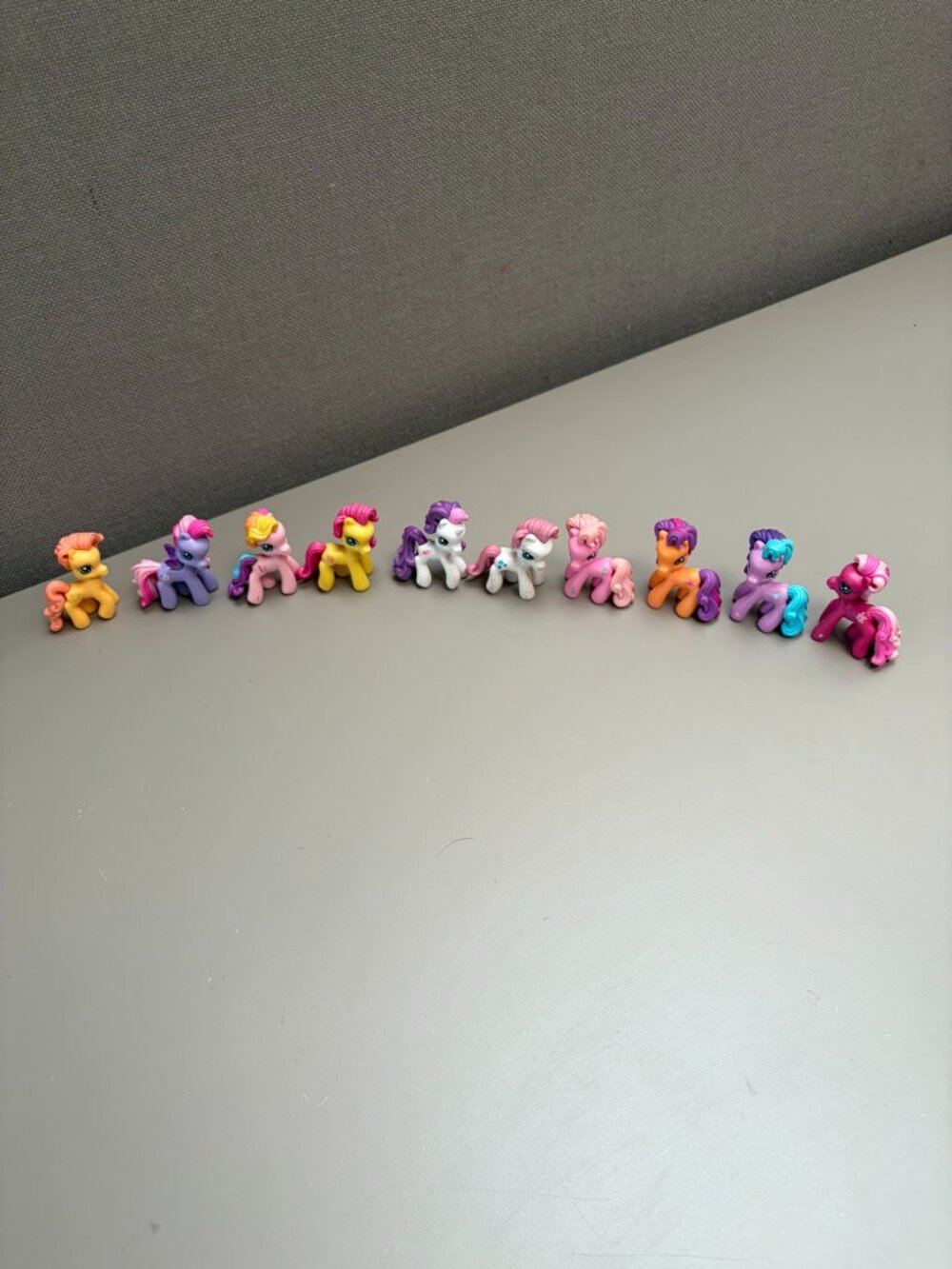 Lot of 10 mini My Little Ponies ranging from white yellow pink and orange